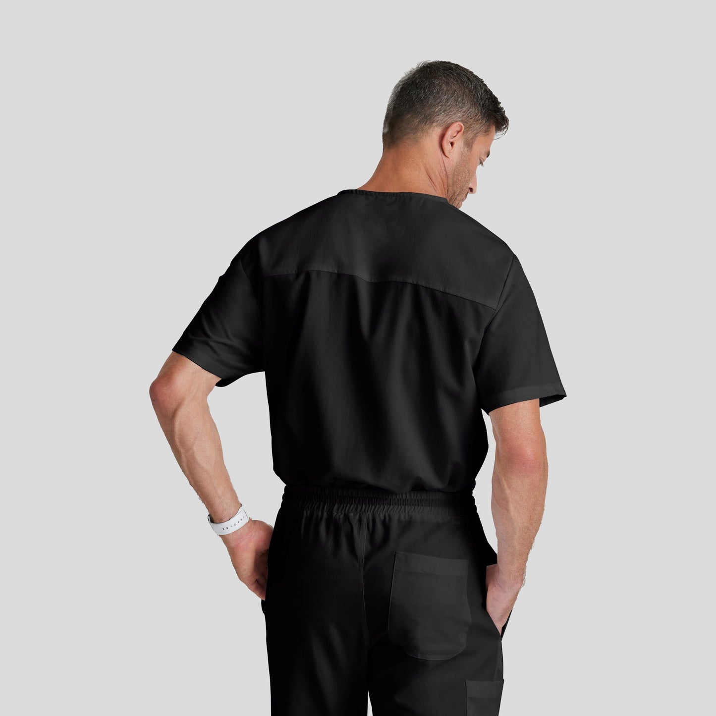 Medical Scrub Top Grey's Anatomy for Men in Black color at Scrubser Medical Uniforms in Riyad and Jedda