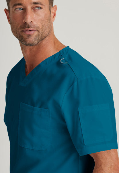 Medical Scrub Top Grey's Anatomy for Men in caribbean blue bahama color at Scrubser Medical Uniforms in Riyad and Jeddan